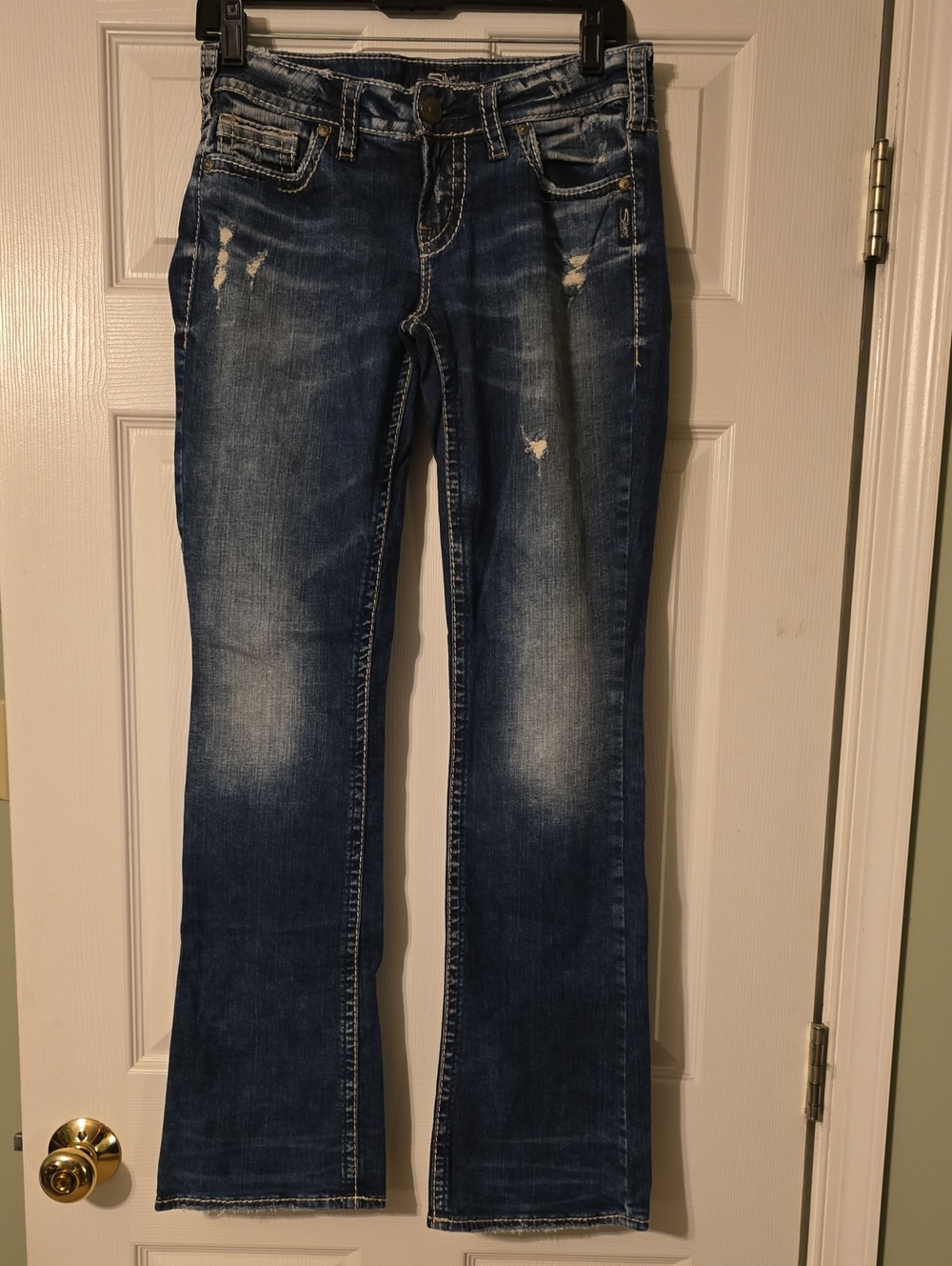 Silver Jeans Women's Dark Wash Bootcut with Distressed Detailing
